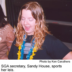 Sandy House sports her leis