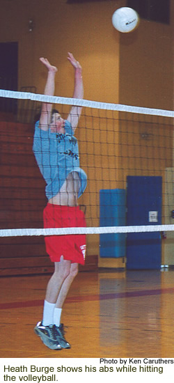 Heath Burrage plays volleyball