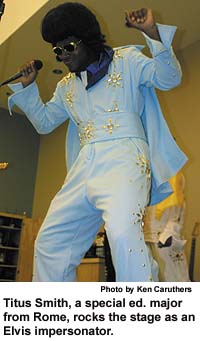 Titus Smith, a special ed. major
from Rome, rocks the stage as an Elvis
impersonator
