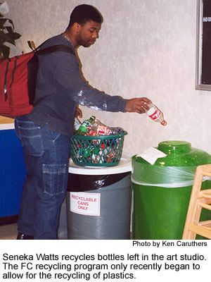 Seneka Watts is recycling bottles.
