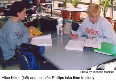 Alice Nixon and Jennifer Phillips take time to study