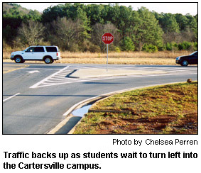 Traffic backs up as students wait to turn left into the Cartersville campus.