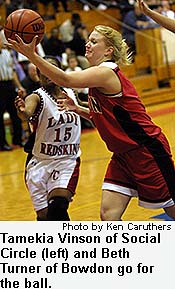 Tamekia Vinson of the Social Circle (left) and Beth Turner of Bowdon go for the ball.