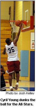 Cyril Young dunks the ball for the All-Stars.