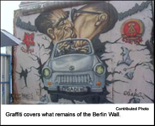 Graffiti covers what remains of the Berlin Wall.