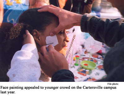 Face painting appealed to younger crowd on the Cartersville campus last year.