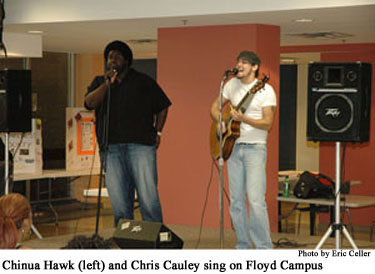 Chinua Hawk (left) and Chris Cauley sing on Floyd Campus.