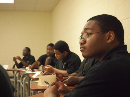 From left: Travis Boyce, Jordan Walters, Chris Carter and Shanton'eo Elkins listen to Bledsoe's presentation. Photo by Scott Hale.