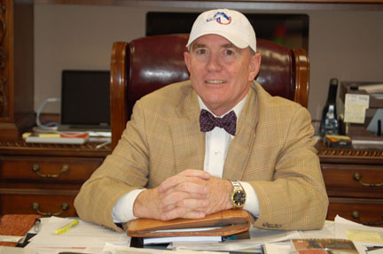 Randy Pierce shows his school spirit by wearing his GHC Charger baseball cap. Photo by Perez Campos.