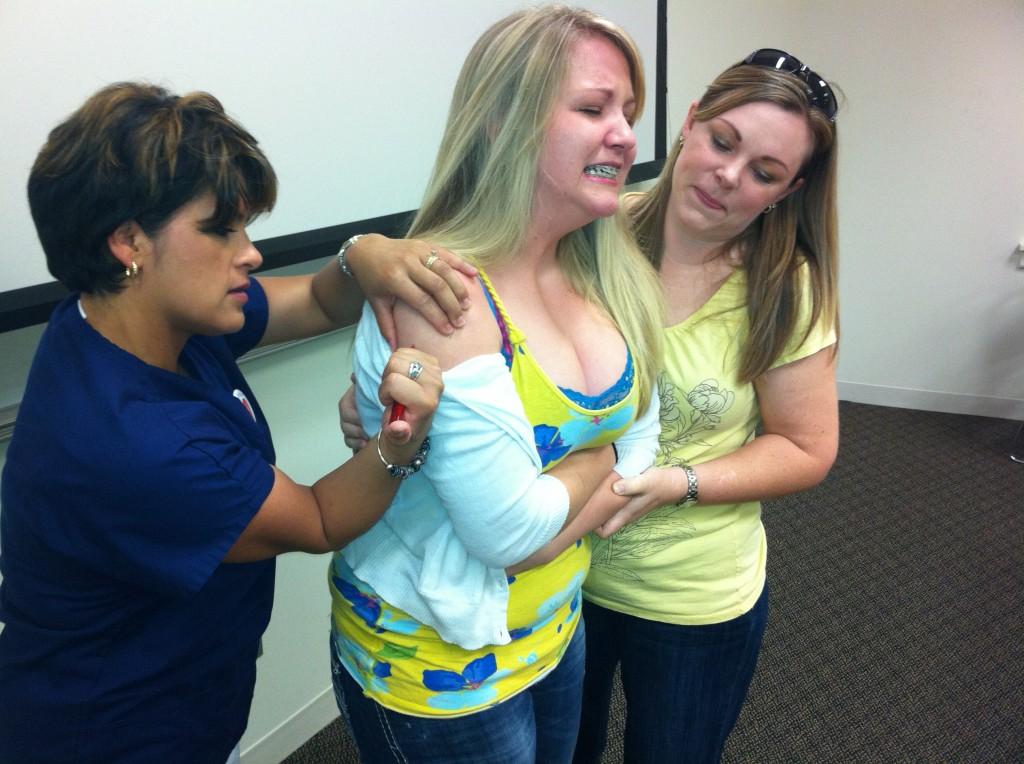 Theater students (from left) Adriana Shults, Brigitta Watts, and Kristin Putting rehearse Rachel Buckley’s play, “They Say I Am Crazy,” in Cartersville.