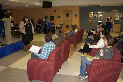 Kursten Hedgis explaining the culture of introverts to the crowd at the Intercultural Fair. Photo taken by Cole McElroy.