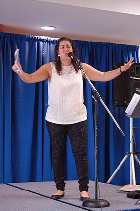 Caroline Rothstein perfoming spoken word poetry at the Floyd campus. Photo by Ryan Jones.