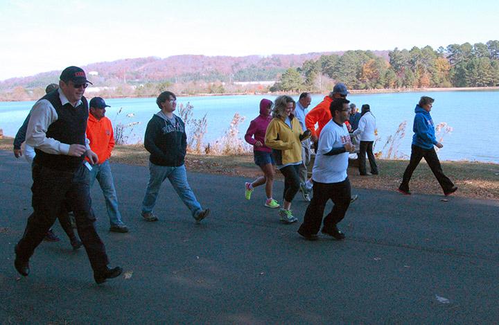 Participants begin the 1.85 mile track during the Turkey Day Walk event. Photo by Pedro Zavala