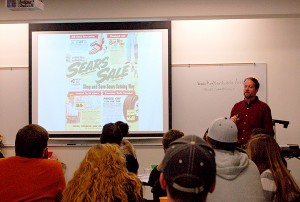 Joe Samuel Starnes shows his Sears catalog from the 1950's that he used for research in his novel.