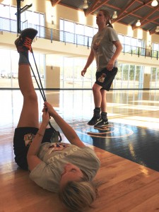 (from left) Amber Seeba and Morgan McKinney get in shape for the inaugural softball season at GHC bu Tatiana Smithson