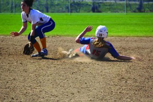 Freshman, Kayleigh Medlin slides into first base. Photo contributed