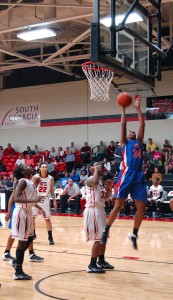 Aujuana Dawkins makes a jump shot in the Lady Chargers' GCAA championship game against the Lady Jets.