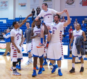 Some of the Chargers team carry Jesse Stroup while celebrating their victory in the last game of the regular season. Photo by Pedro Zavala.