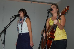 Sister act duo Adelee & Gentry perform music from their new album in the Floyd Student Center. Adelee (right) started playing guitar at age 10. Photo by Anna Douglass.