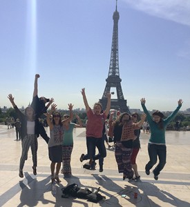 Trip participants show their enthusiasm in front of the Eiffel Tower. They are Matt Massey (left rear) and (from left) Halie Hicks, Alex MacMurdo, Karley Callaway, Annie Hill, Hillery Sawyer, Topher Knight and Megan Broome. Photo by Amanda Howell.