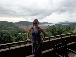 During her trip, Burkhalter stands in front of Lake Volta in Ghana, the largest reservoir by surface area in the world. Contributed.