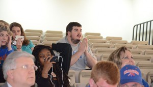 Jesse Bishop, associate professor of english on the Floyd campus, hopes for a miracle as Chargers fight off Butler during overtime. Photo by Anna Douglass