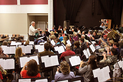 Professor of music directs local orchestra. Photo by Jeremy Huskins