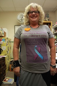 Susan Claxton, human services program coordinator, shows off her suicide awareness T-shirt. Photo by Lydia Chandler.