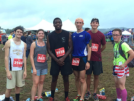 From left: Alex Jackson, Lauren Morrow, Marquis Holmes, Chris Hart, Morgan Brake, and Brett Arnold gather for a photo after their first competitive race of the year. Contributed photo. 