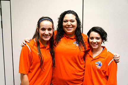 Softball players (from left) Caitlin Parks, Brianna Fickes and Kayla Street are ready for the upcoming season. Photo by Sarah Cousar