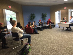 The Policial Science and Criminal Justice Club meets in the Solarium to discuss today's politics. Photo by Taylor Barton