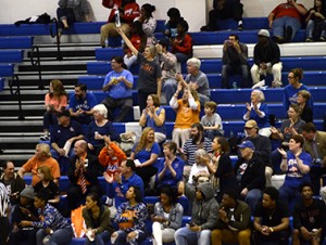 Booster Club members cheer along with other fans at the Chargers' quarter-final game. Photo by Taylor Barton