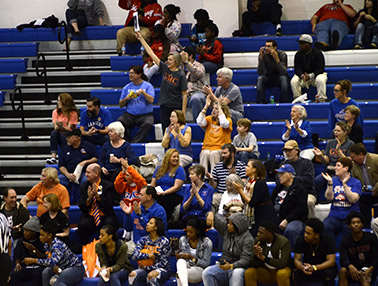 Booster Club members cheer along with other fans at the Chargers quarter-final game. Photo by Taylor Barton