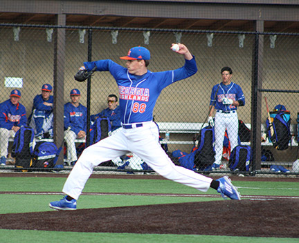 John McClure pitches to a rival team. Contributed
