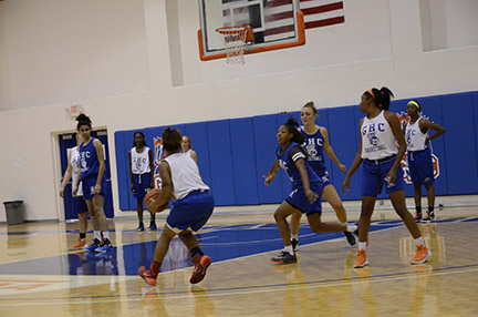 The Lady Chargers practice their moves in the Floyd campus gym. Photo by Jaida Lovelace  