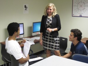 Connie Watjen (center)talks with Isaiah Wong(left) and Andrew Buttons. Photo by  Matthew Franklin 
