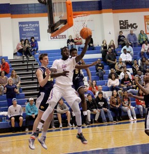 Massamba Dioum goes for a layup during a game earlier this season. Photo by Shannon Francis