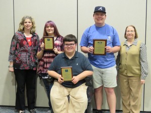 From left, Adviser Cindy Wheeler, Smp editors Kayla Jameson, Joshua Mabry,Joe Webster and Adviser Kristie Kemper pose with thier awards. Photo contributed