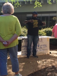 Leonard Hall, FCA adviser, describes the purpose of the Prayer Walk prior to the walk. Photo by Joshua Mabry 