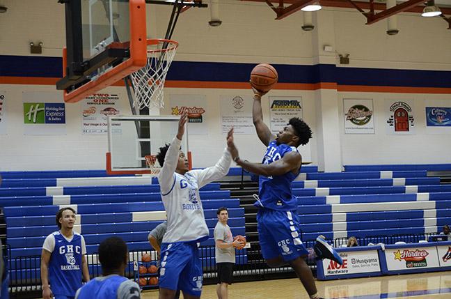 Jeremiah Buford (left) and Melvin Lee practice their skills.  Photo by Xavier Freeman