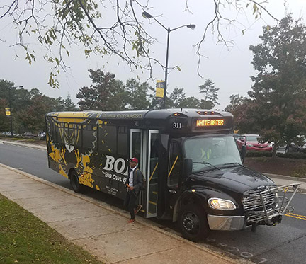 Students ride a bus to the Marietta campus from White Water due to parking issues. Contributed
