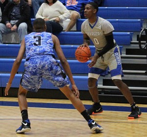 Derrick Cook is looking to pass the ball. Photo by Catie Sullivan