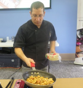 Chef Egg prepares chicken for tacos at the Floyd campus. Photo by Nick Whitmire