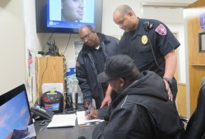 David Horace (center), GHC’s chief of police, confers with campus security personnel at the Floyd campus. Photo by Nick Whitmire