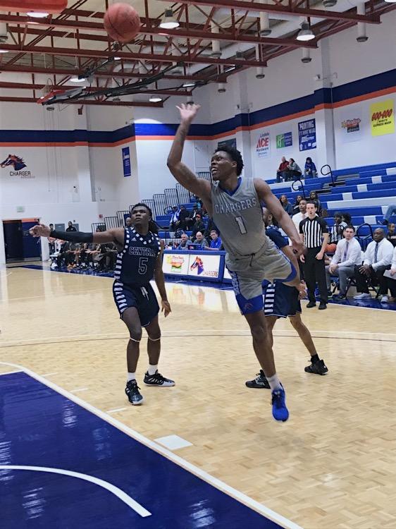 Cahiem Brown jumps for the ball. Photo by Brandon Dyer.