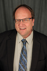 Here’s the picture for the B2B feature. Byline: Photo contributed by Georgia Highlands College. Caption: John Hershey, dean of humanities, has been involved with Brother 2 Brother since it started 13 years ago.