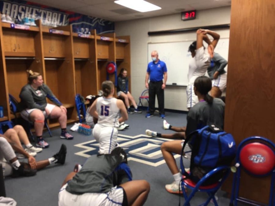 Lady+Chargers+getting+final+pre-game+instructions+from+Coach+Harrell