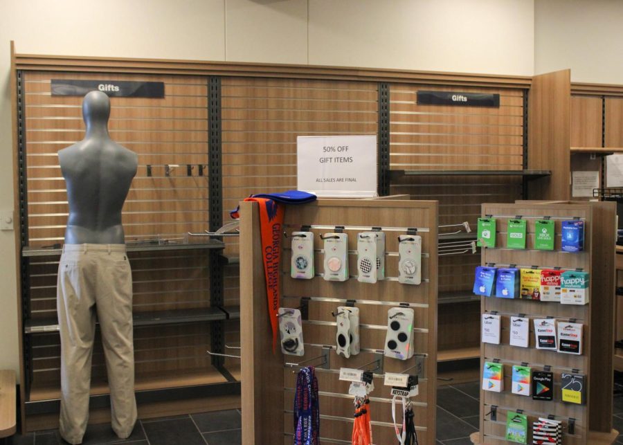 The walls and shelves of the on-campus bookstores are being emptied to prepare for the bookstore operator transfer. 