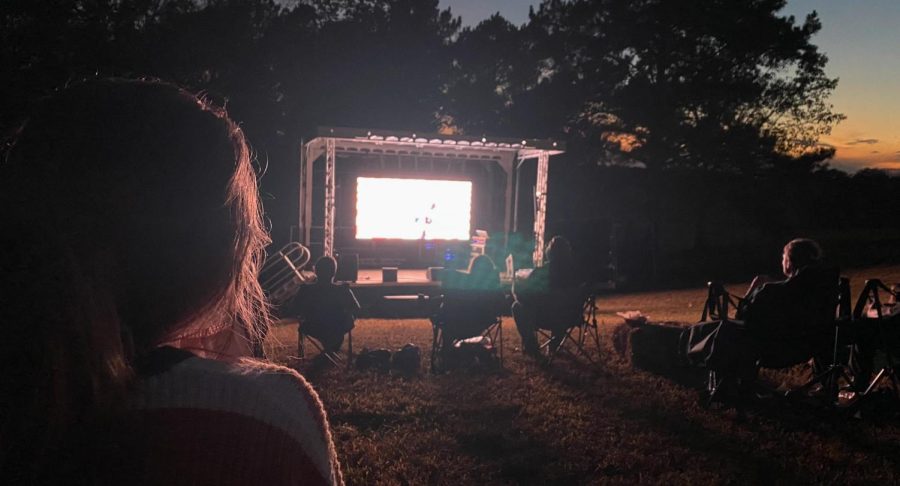 Attendees of the outdoor showing of Halloween (2018) sat in lawn chairs and on towels and blankets.