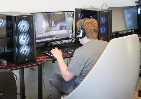 Tobias Johnston, Cartersville campus biology major, uses one of the new gaming PCs to play Team Fortress 2. 